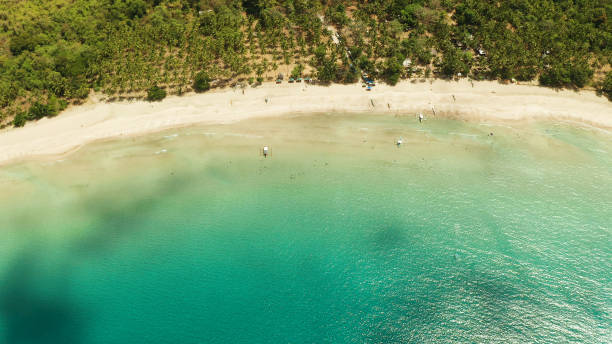 istock Tropical beach with white sand, view from above 1291373839