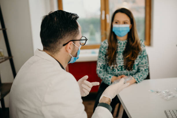 istock Doctor vaccinates patient with vaccine 1291374243