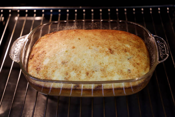 istock Homemade cheesecake in electric oven 1291379307