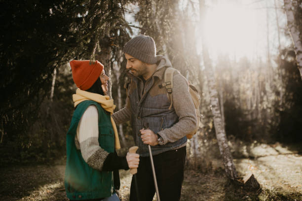 istock Young couple walks in nature 1291380860