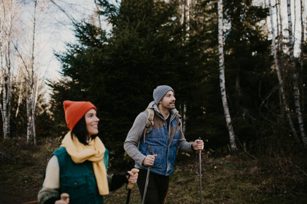 istock Young couple walks in nature 1291380914