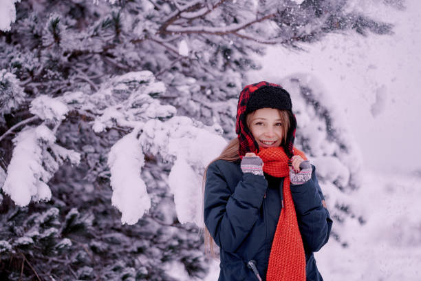 istock Girl with woolen cap 1291382165