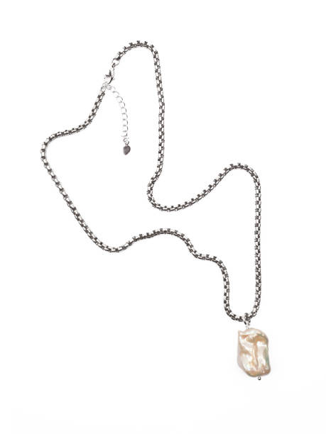 Luxury elegant baroque pearl pendant with silver chain isolated on white background