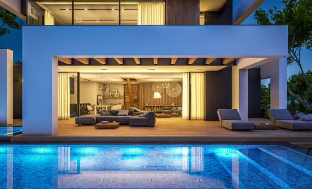 istock 3d rendering of modern house in luxurious style in night 1291384520