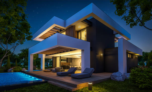 istock 3d rendering of modern house in luxurious style in night 1291384584
