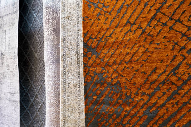 istock Carpets displayed in a carpet store showroom 1291384595