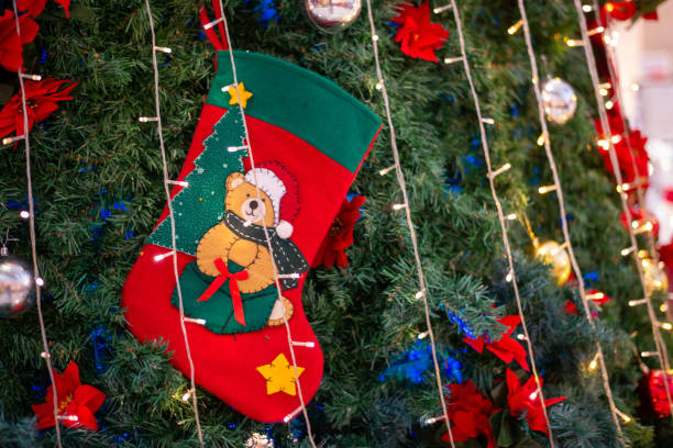 istock Christmas bear sock hang as decoration 1291388619