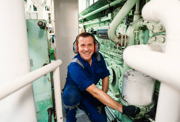 istock Marine engineer officer controlling vessel enginesand propulsion in engine control room ECR 1291389268