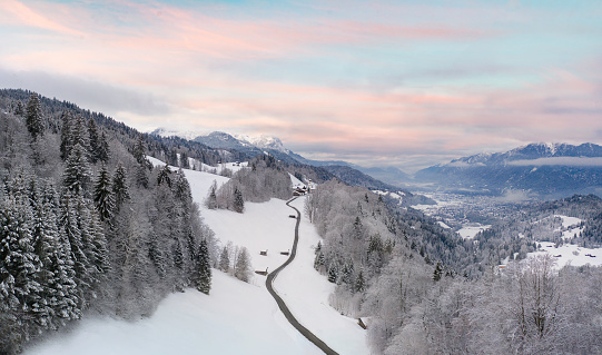 Aerial panorama of romantic wintery landscape in the mountains