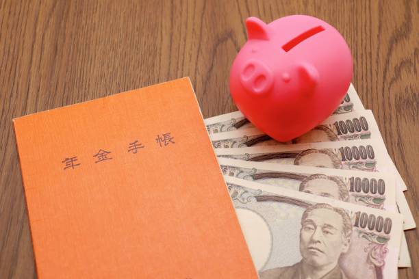 istock Piggy bank and pension book 1291390707