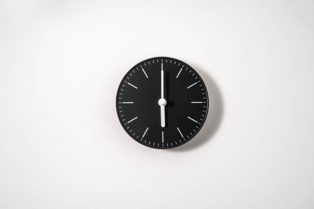 istock close up of an office clock on white background with clipping path 1291391052