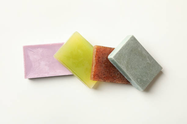 istock Different pieces of natural soap on white background 1291393551