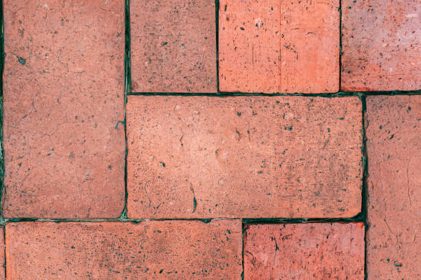 istock Big old red brown brick wall vintage texture background, rectangle stone wall surface 1291395527