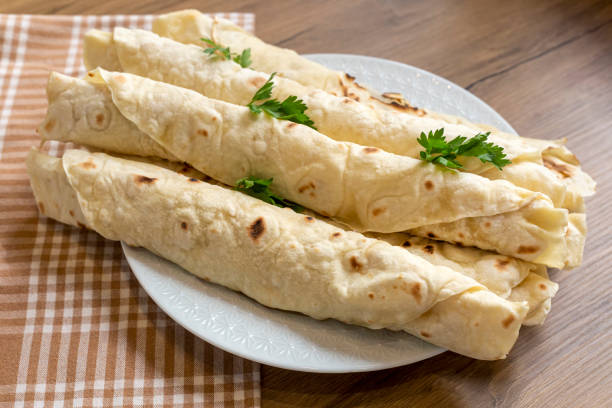 istock Traditional, local Turkish food; cheese pastry wrap (Turkish name; Sikma) 1291401782