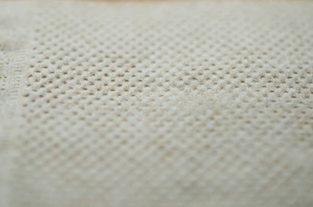 istock closeup blank tissue paper textured background. 1291407899