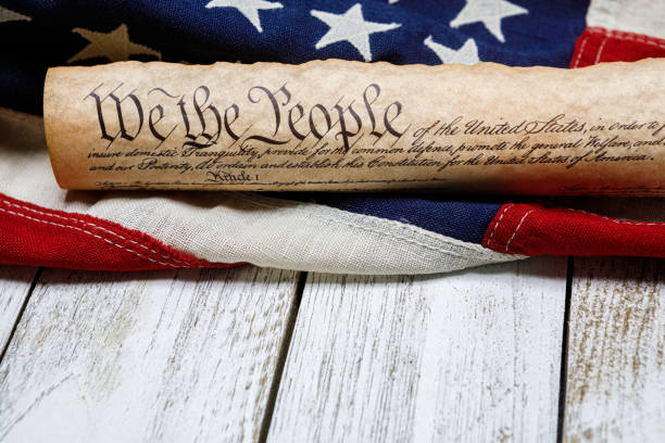 istock U.S. Constitution Rolled Up on an American Flag 1291407986