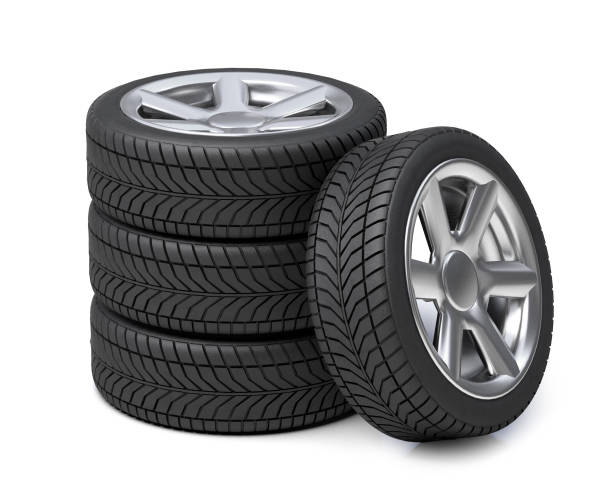 istock Car tires and rims. Stack of car wheels. isolated on white background. 3d render 1291408611