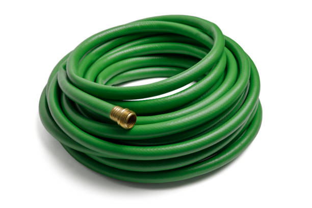 istock Green Garden Hose Isolated on White 1291408629