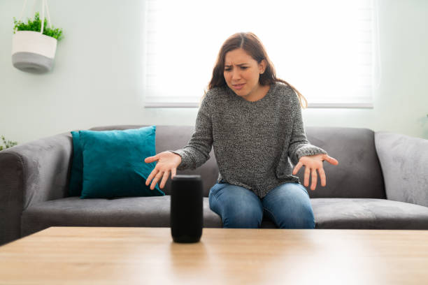 istock Good-looking woman looking confused because her smart device broken 1291415243