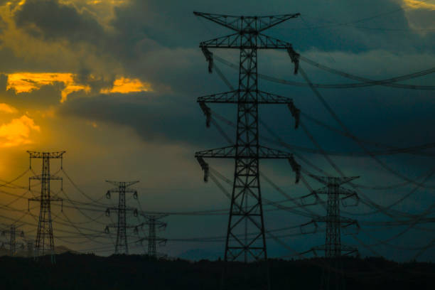 istock Silhouette image of a sunset and a steel tower 1291417686