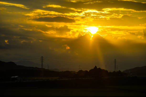 istock Silhouette image of a sunset and a steel tower 1291417743