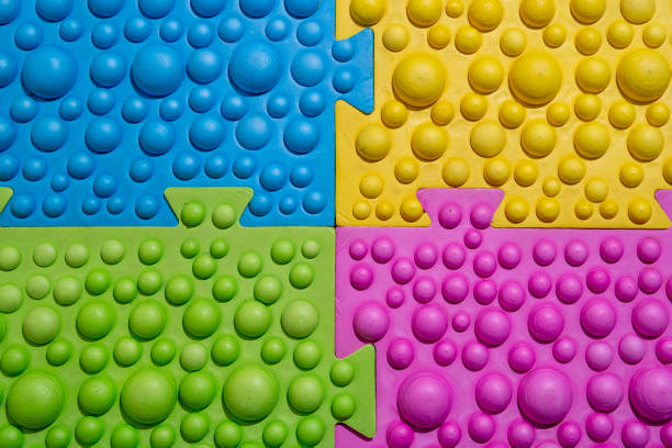 istock fragment of a multi-colored children's orthopedic mat 1291419571