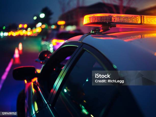 Nightime Police Traffic Stop Stock Photo - Download Image Now - Police Force, Police Vehicle Lighting, Drunk Driving