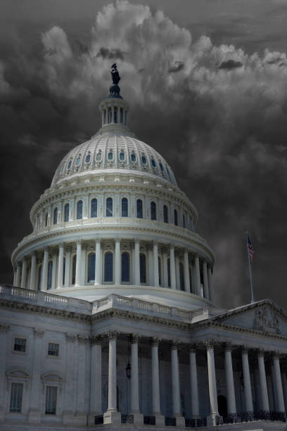 istock The Capitol building in Washington DC with dark storm clouds 1291421549