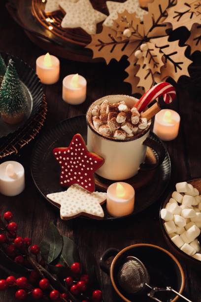istock Hot Chocolate with Marshmallow Among Christmas Decorations 1291422682