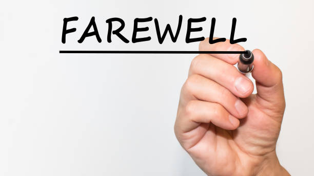 istock the hand writes text FAREWELL with a marker on a white background. business concept 1291427310