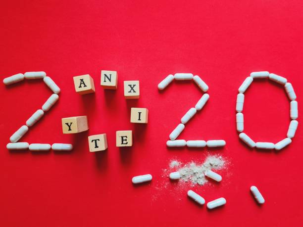 istock written anxiety and written 2020 with pills 1291433730