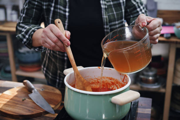 istock Preparing Delicious Tomato Soup in Domestic Kitchen 1291436839