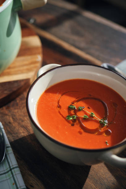 istock Delicious Tomato Soup Served with Olive Oil and Thyme 1291437177