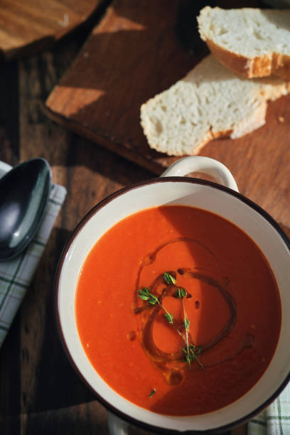 istock Delicious Tomato Soup Served with Olive Oil and Thyme 1291438127