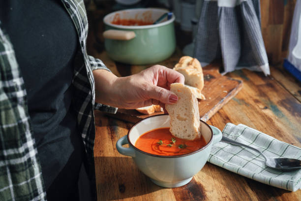 istock Preparing Delicious Tomato Soup in Domestic Kitchen 1291438194