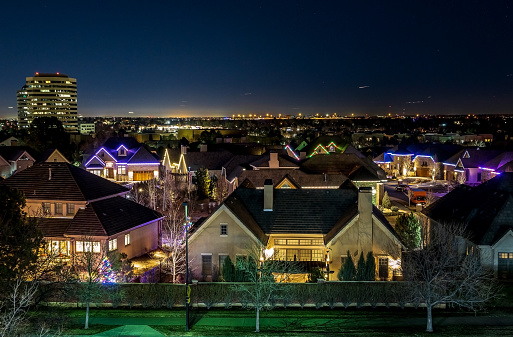 Englewood neighborhood illuminated for the holiday viewed from the light rail station. Denver metro area, Colorado