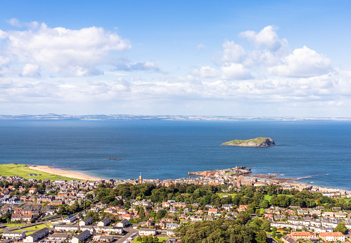 A view over the East Lothian town of North Berwick, taken from North Berwick Law, looking across the Firth of Forth to Fife.