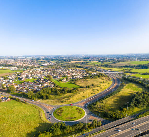 istock Housing estate and transport links from above 1291440439