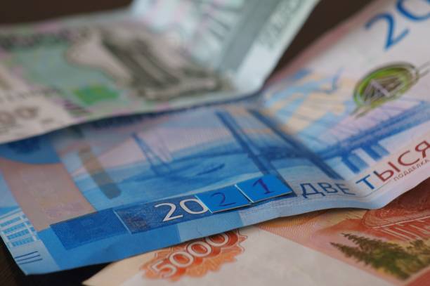 istock Cash bills close-up on the table. 1291440601