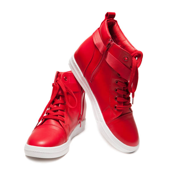 istock Red sport shoes isolated on white background 1291440875