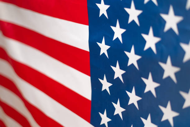 istock American flag as a background. Blurred background. 1291446584