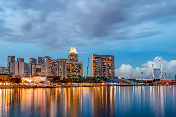 istock Singapore skyline at twilight  waterfront 1291446764