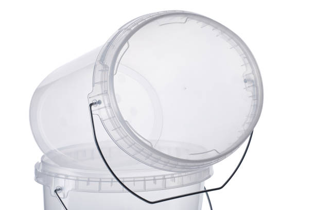 istock Transparent oval plastic bucket with transparent lid, plastic containers on white background, food plastic box isolated on white, product packaging for foodstuff or paints, adhesives, sealants 1291450916