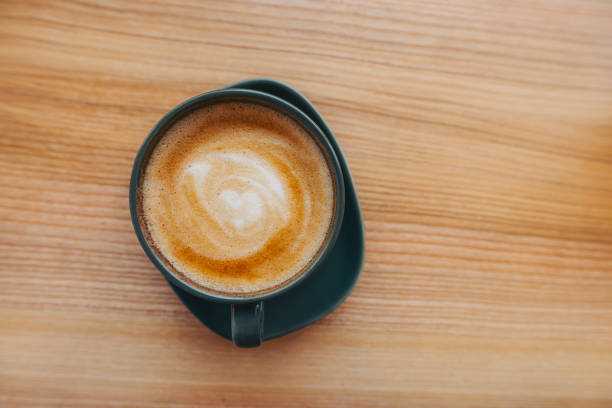istock A cup of coffee stands on a wooden table 1291452207