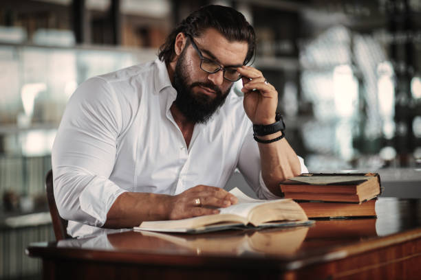 istock Businessman in an office, studying 1291454646