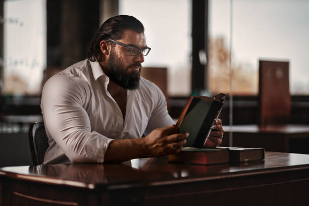 istock Businessman in an office, studying 1291455423