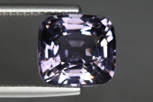 istock natural purple spinel on the grey background 1291455458