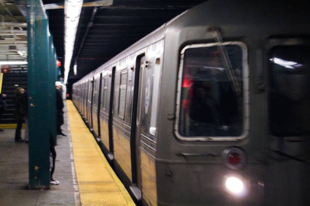 speeding subway train in brooklyn - underground imagens e fotografias de stock