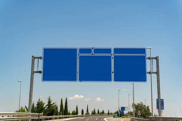 istock Spanish highway with traffic signs and clear sky 1291460692