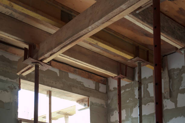 istock view of wooden formwork with metallic holders, which will be filled with overlap between floors in country house under construction from foam block 1291460789